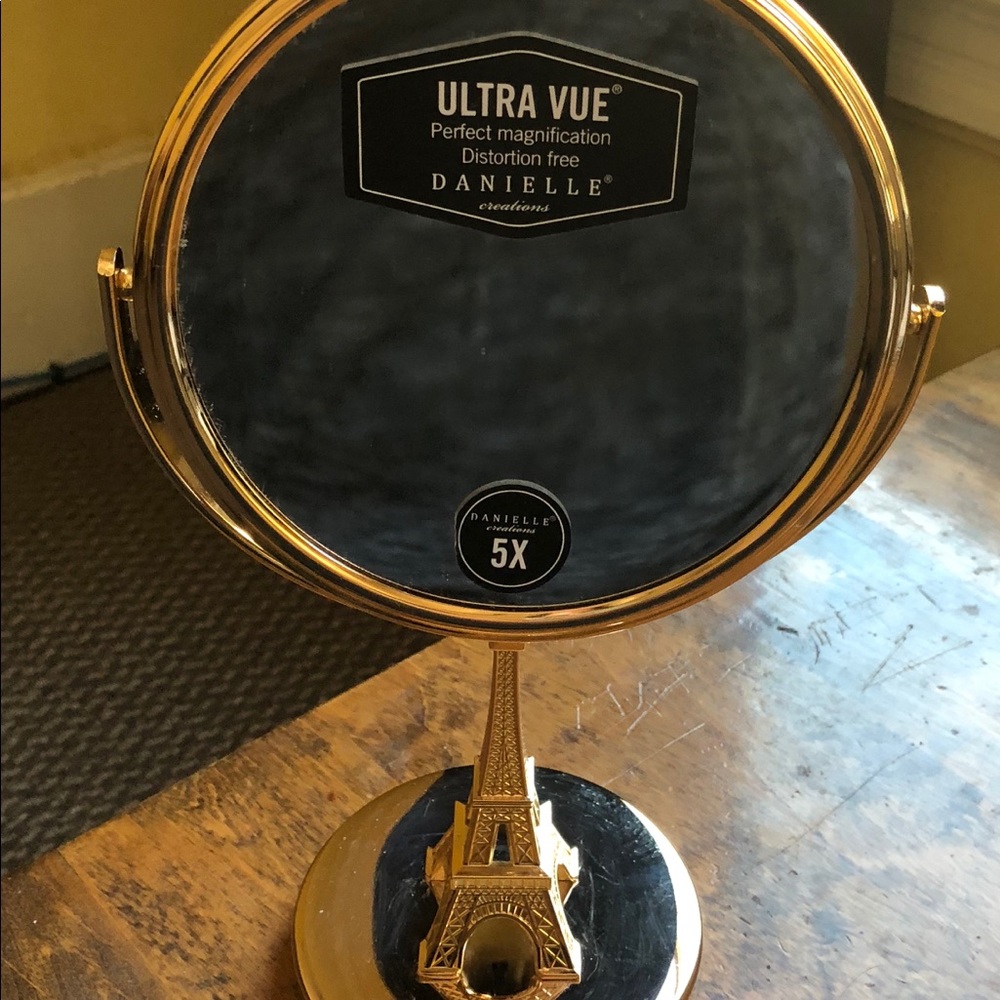 Double side mirror with Eiffel Tower stand.